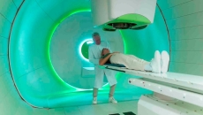 Doctor in a diagnostic imaging space with a patient