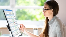Person sitting at a computer 