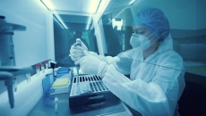 Technician working in a lab Technician working in a lab