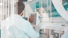 Technician reviewing data Technician reviewing data