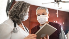 Healthcare provider and patient talking to each other