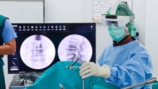 A surgeon performing a surgery using an augmented reality-based navigation system A surgeon performing a surgery using an augmented reality-based navigation system