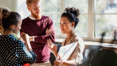 People standing around talking People standing around talking