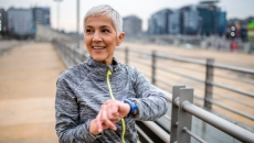 Person using a wearable watch Person using a wearable watch