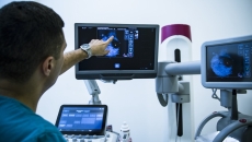 Healthcare professional looking at an image Healthcare professional looking at an image