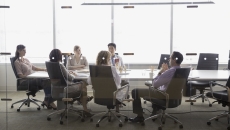 Executives meeting in a conference room Executives meeting in a conference room