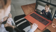 Healthcare professional interacting with a patient via telehealth platform Healthcare professional interacting with a patient via telehealth platform