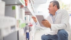 Pharmacist conducting inventory Pharmacist conducting inventory