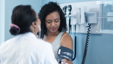 A person getting a blood pressure check during a medical appointment