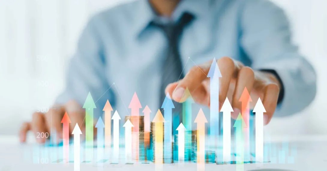 Businessperson and a digital interpretation of a financial graph Businessperson and a digital interpretation of a financial graph