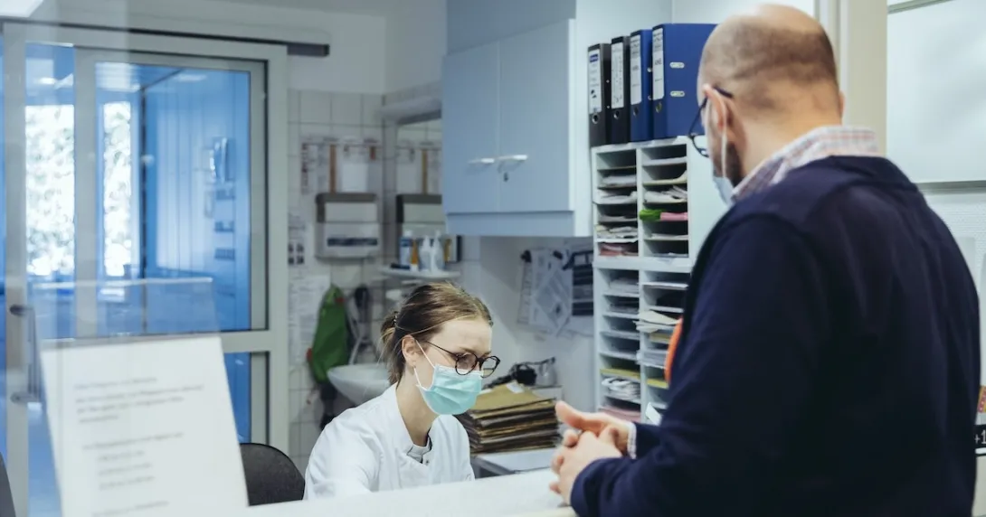 Healthcare professional interacting with patient
