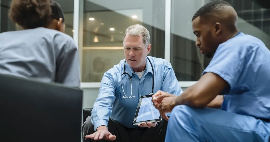 Physicians reviewing data