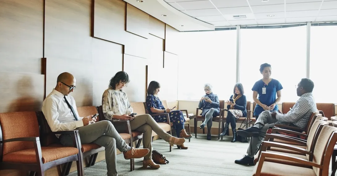 Patients sitting in a waiting room