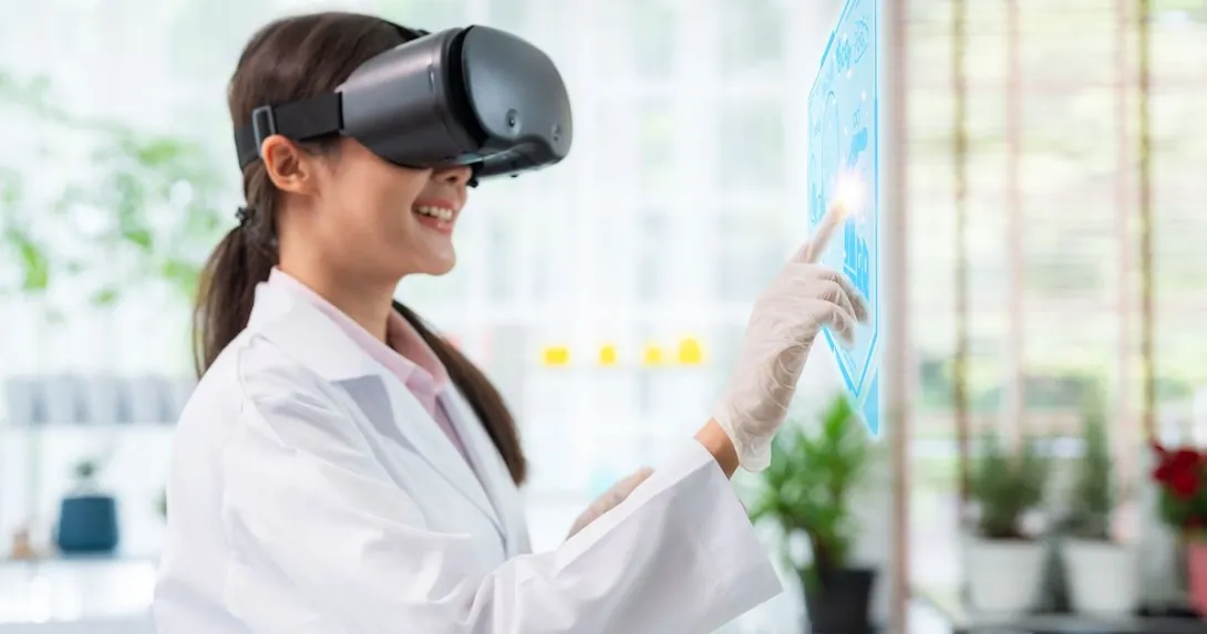 Healthcare provider wearing a virtual reality headset while touching a virtual screen