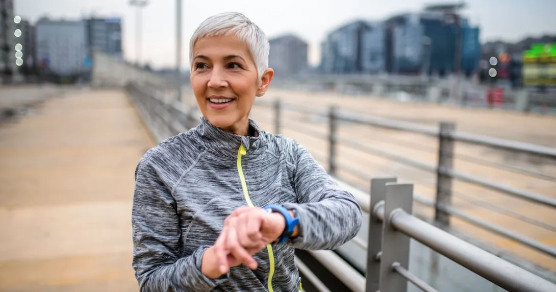 A person sporting a smartwatch while on a run
